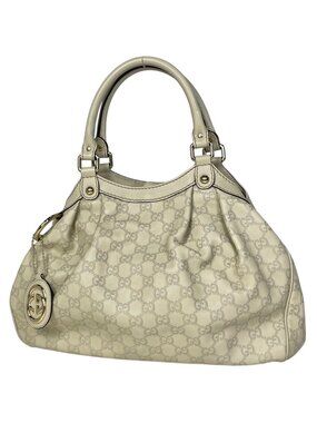 Gucci Guccissima Ski Handbag Shimarais the Ivory